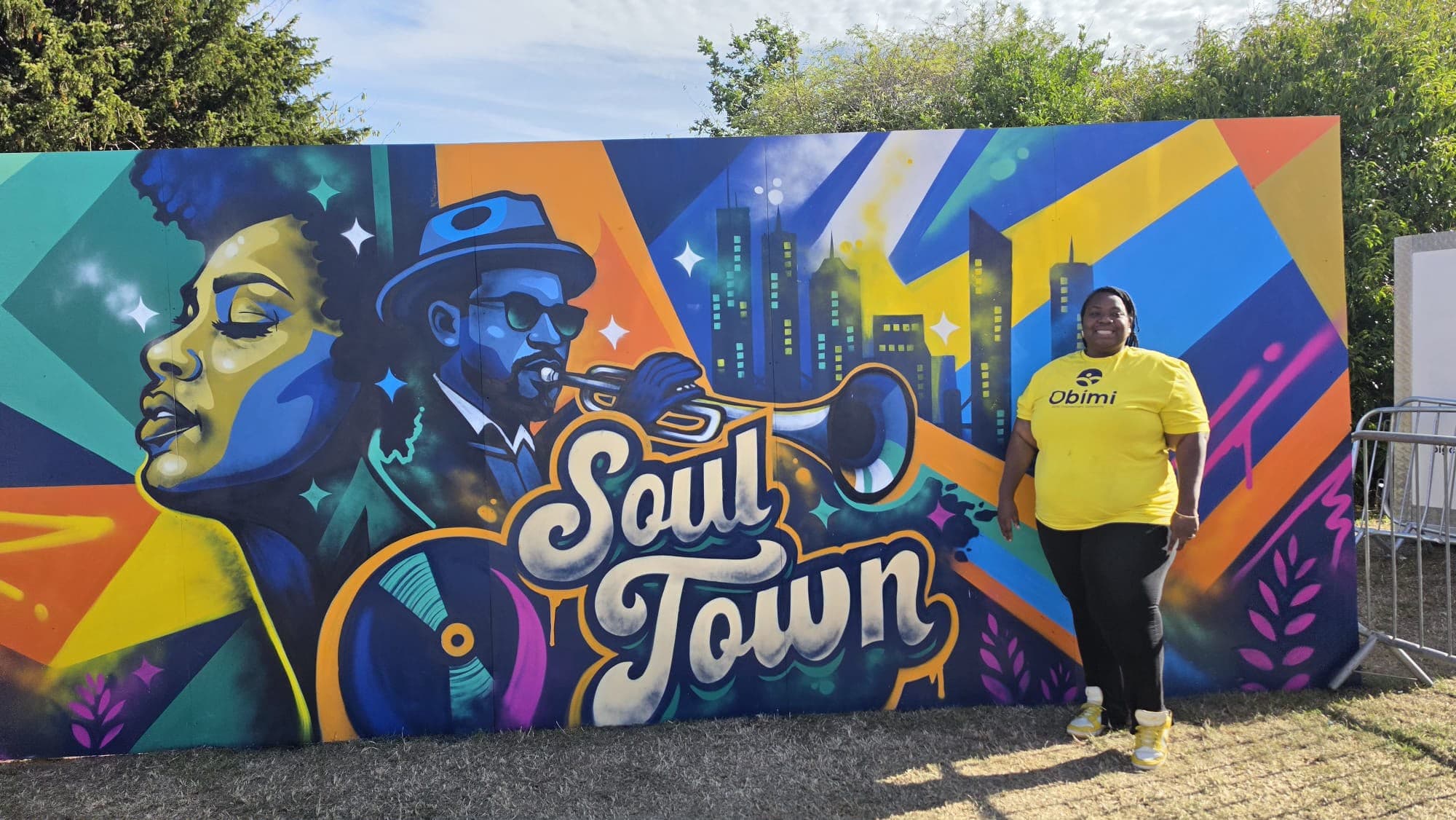 Helen in front of the Soul Town mural